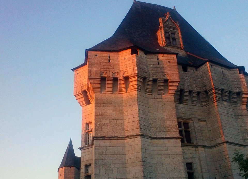 Facade of the donjon at sunset